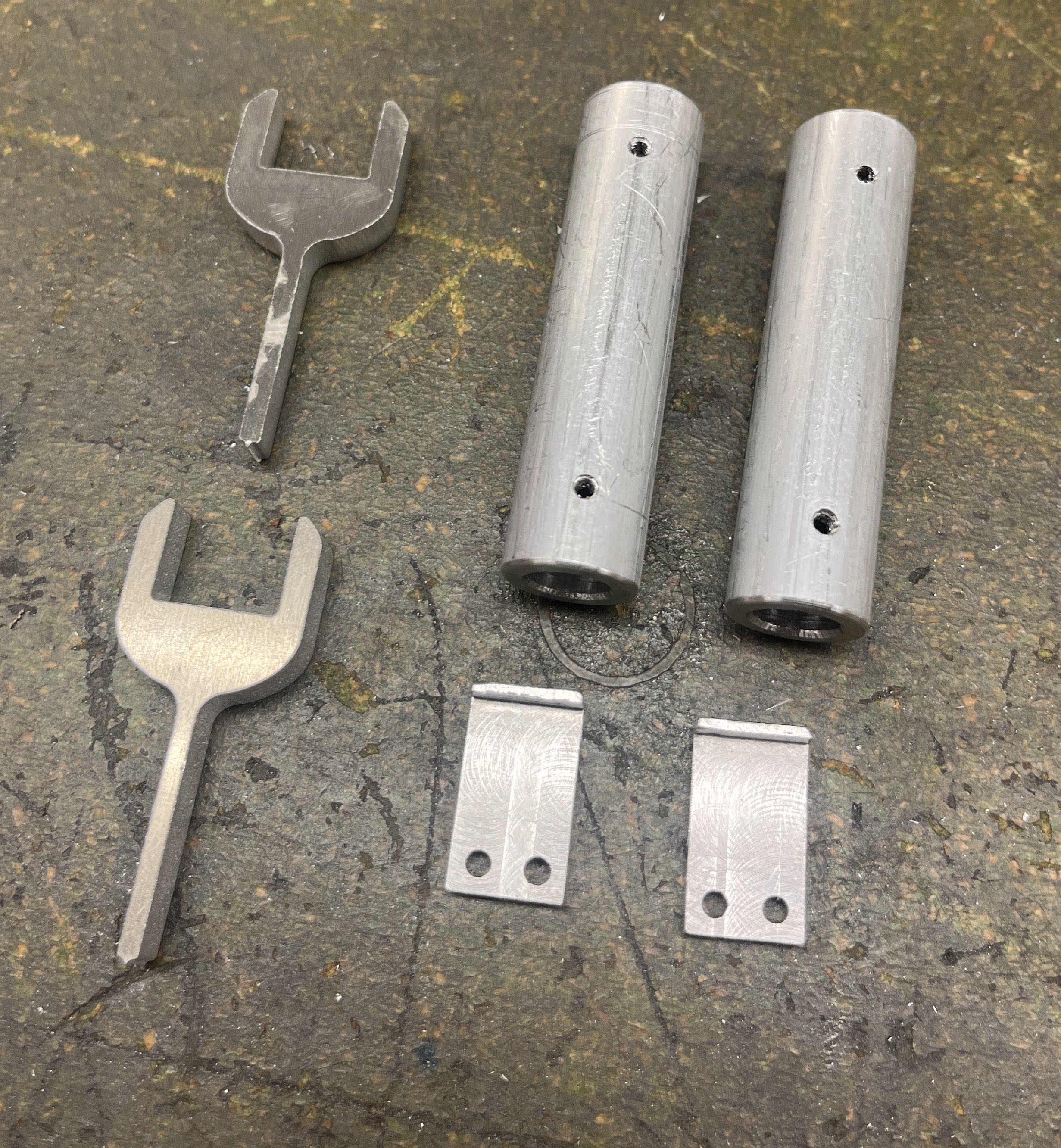 Aluminum shaft sleeves, phone holding 'hooks' and wrenches